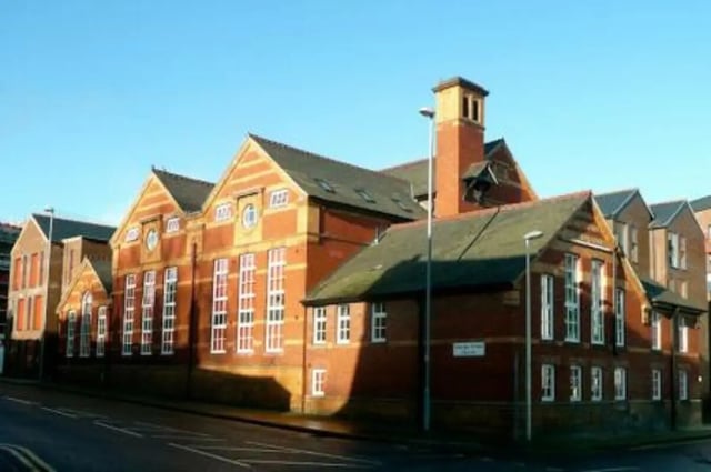 Brick building with tall windows exterior at Trinity Hall in Chester Student Accommodation