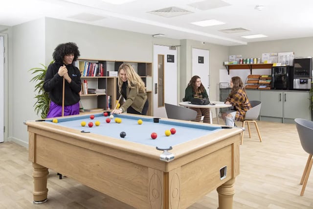 Pool table and students playing and studying common area at Athena Studios in Birmingham Student Accommodation