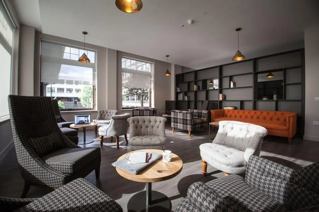 Seating and shelves in a communal living area at Bath Street in Glasgow Student Accommodation