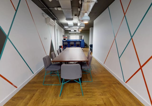 Dining table chairs and kitchen counter communal area at iQ Elgin Place in Glasgow Student Accommodation