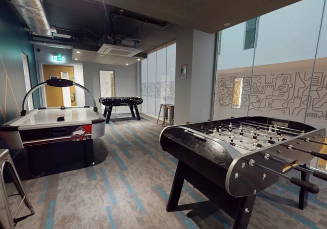 Air hockey table foosball tables bar stool playing area at iQ Elgin Place in Glasgow Student Accommodation