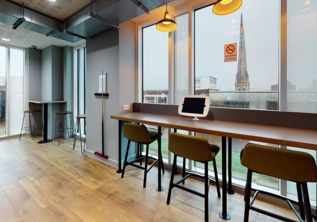 Bar stools tablet desk large windows common area at iQ Elgin Place in Glasgow Student Accommodation