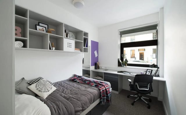 Bed desk shelves and chair bedroom at Clifton & Stewart House in Glasgow Student Accommodation