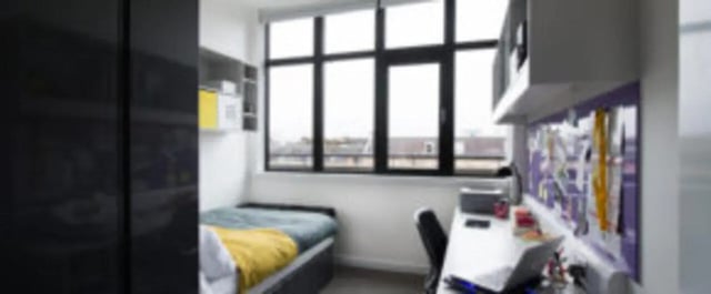 Bed desk and shelves bedroom at Clifton & Stewart House in Glasgow Student Accommodation