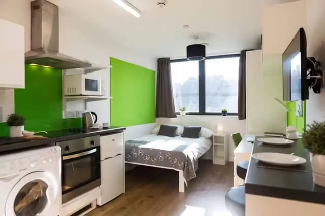 Kitchen bed study area and TV studio apartment at St Lawrence House in Bristol Student Accommodation