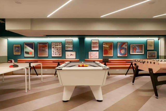 Pool table foosball table and art living room at Culver House in Bristol Student Accommodation