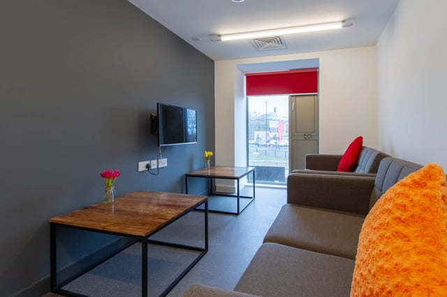 Sofa television tables and window living room at AXO Paradise Student Village in Coventry Student Accommodation