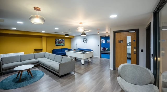 Lounge with pool table sofa and chairs communal area at Haddington Place in Edinburgh Student Accommodation