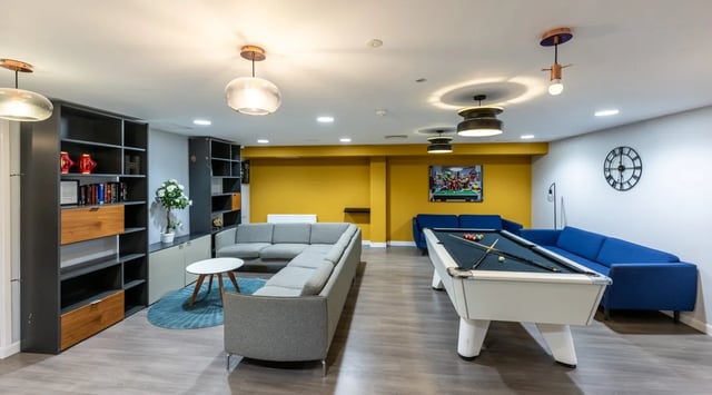 Pool table sofas shelves and seating living room at Haddington Place in Edinburgh Student Accommodation