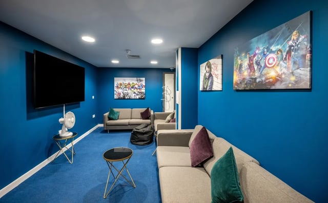 Sofa beanbag television artwork and fan living room at Haddington Place in Edinburgh Student Accommodation