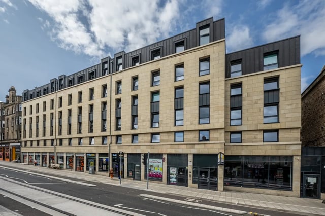 Modern building with shops on ground floor exterior at Haddington Place in Edinburgh Student Accommodation