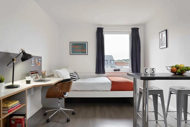 Bed desk chair and table student room at Asa Briggs House in Leeds Student Accommodation