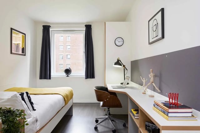 Bed desk laptop lamp and globe bedroom study at Asa Briggs House in Leeds Student Accommodation