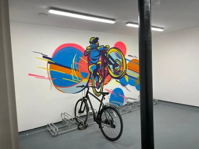 Graffiti art bike rack with bicycle storage area at Silk Mill Lancaster in Lancaster Student Accommodation
