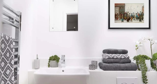 White sink towel rack patterned towels bathroom at Silk Mill Lancaster in Lancaster Student Accommodation