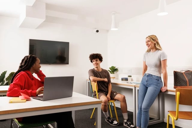 Students laptops and TV in study area at Manor Bank in Newcastle Upon Tyne Student Accommodation