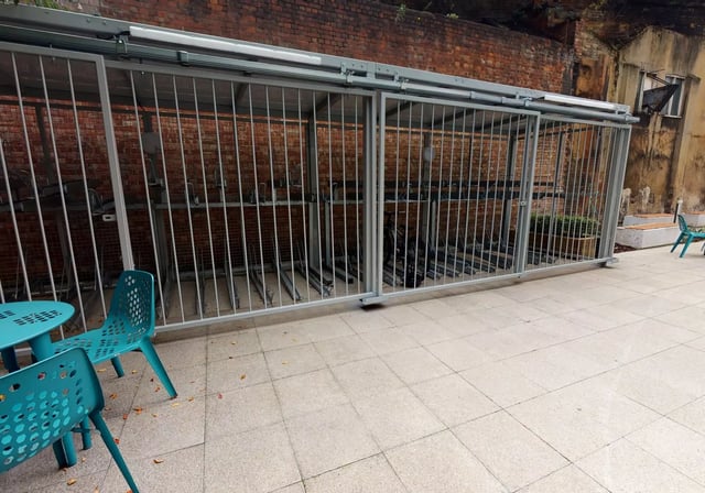 Bike racks and outdoor seating exterior at iQ Bankside in London Student Accommodation
