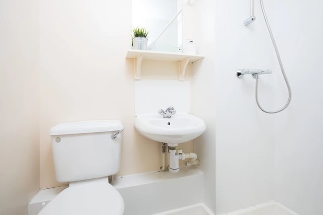 Toilet sink and shower visible Bathroom at Magnet Court in Newcastle Upon Tyne Student Accommodation