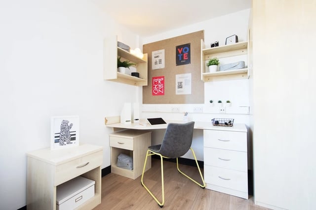Desk chair corkboard and shelves study area at Magnet Court in Newcastle Upon Tyne Student Accommodation