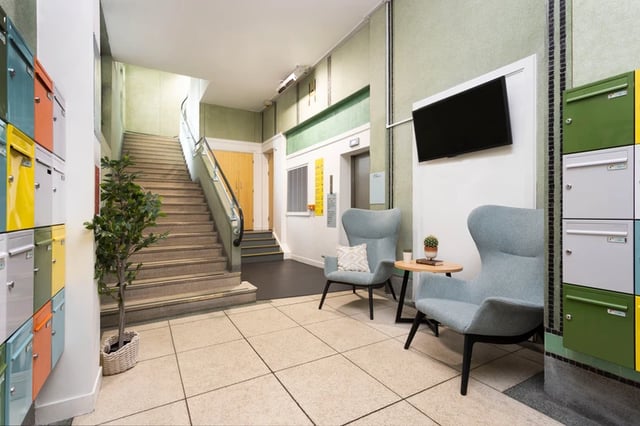 Mailboxes chairs TV staircase common area at Magnet Court in Newcastle Upon Tyne Student Accommodation