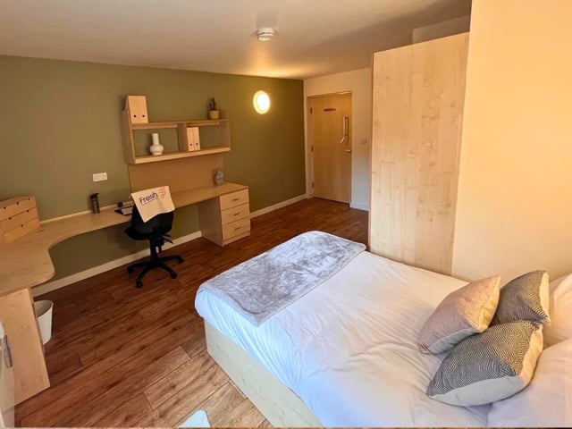 Bed desk and wardrobe student accommodation bedroom at Europa in Liverpool Student Accommodation
