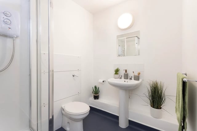 Shower toilet sink plants and towel bathroom at Leadmill Point in Sheffield Student Accommodation