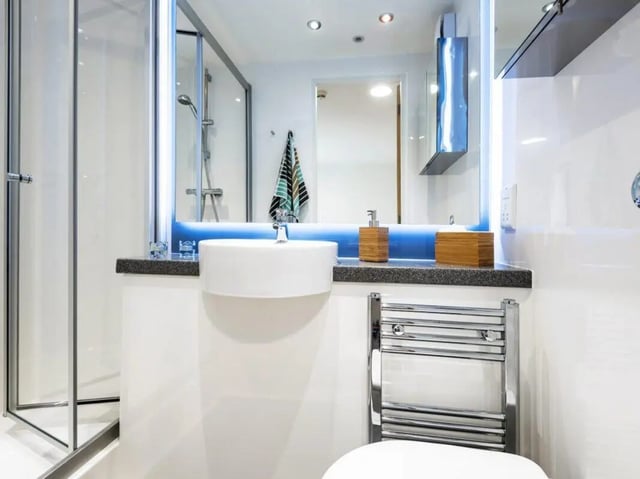 Shower sink and towel rack bathroom at Sharman Court in Sheffield Student Accommodation