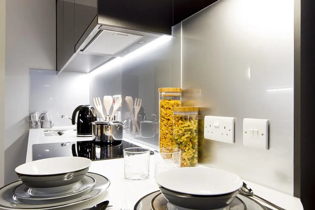 Kettle pots bowls and pasta jars kitchen at Yugo Therese House in London Student Accommodation