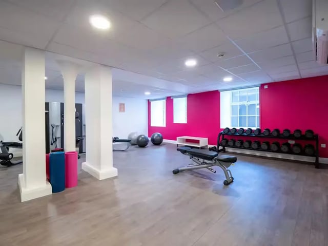 Dumbbells weights bench exercise balls gym at St Leonard's House in Lancaster Student Accommodation