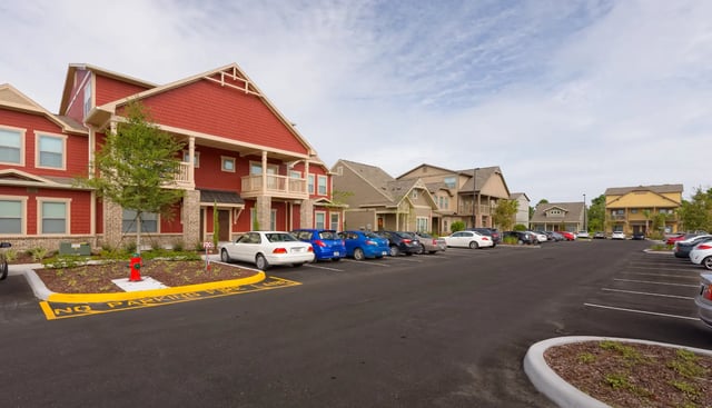 Apartment buildings and parked cars exterior at The Retreat West in Orlando Student Accommodation