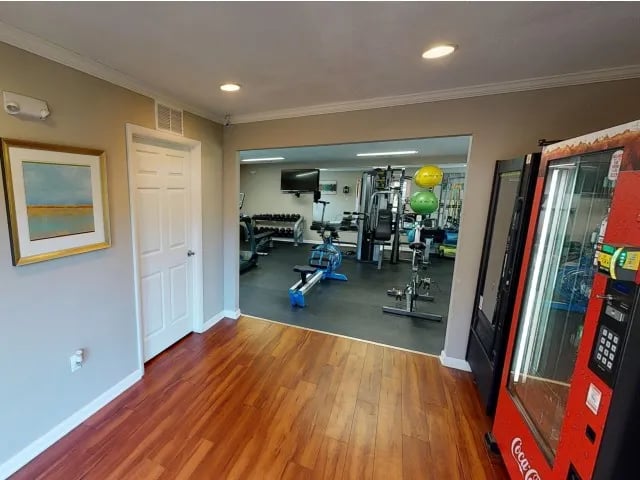 Gym equipment and vending machines gym area at Seminole Flatts in Tallahassee Student Accommodation