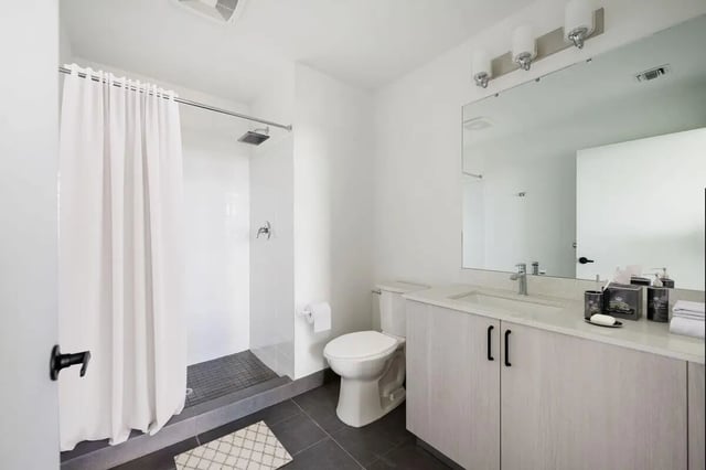 Shower toilet vanity and sink bathroom at Terrazul in Miami Student Accommodation