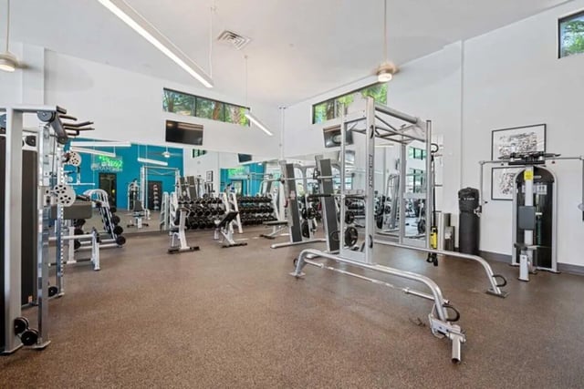 Weight racks machines mirrors and equipment gym at The Verge Orlando in Orlando Student Accommodation