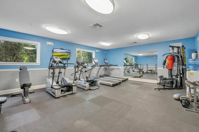 Ellipticals treadmills weight machines gym area at The Landing at Appleyard in Tallahassee Student Accommodation