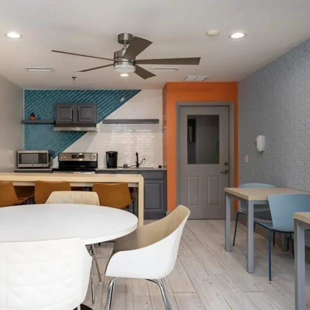 Kitchen appliances counter and tables kitchen at Windsor Hall in Gainesville Student Accommodation