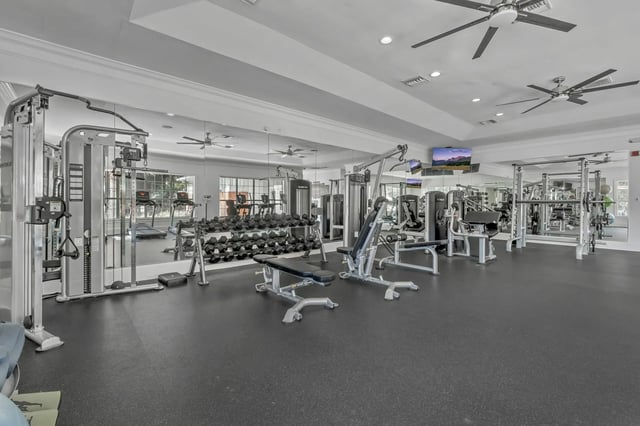 Weight machines treadmills dumbbells gym area gym at Polo Club Tallahassee in Tallahassee Student Accommodation