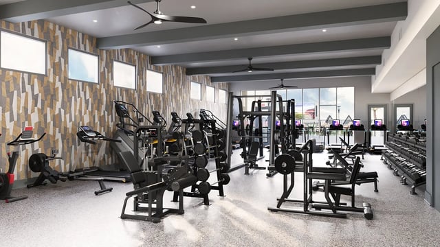 Gym equipment weights treadmills and stationary bikes gym at The Mark Tallahassee in Tallahassee Student Accommodation