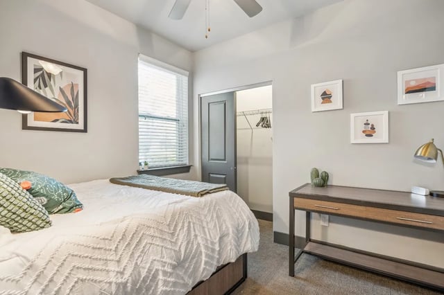 Bed desk and closet visible Bedroom at Oktiv in Tallahassee Student Accommodation