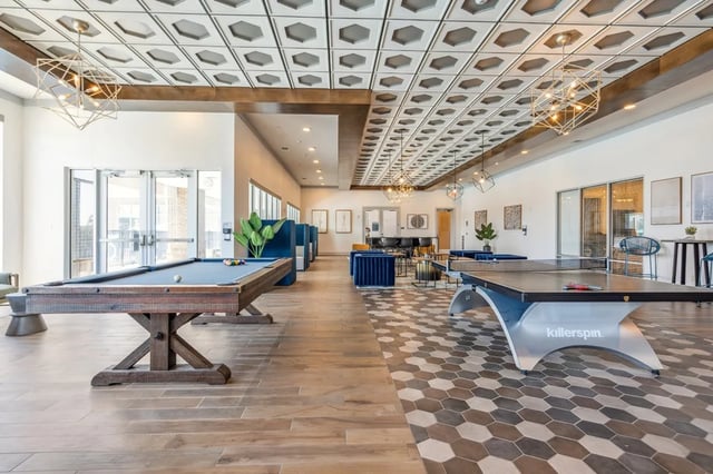 Pool table ping pong table lounge area living room at Oktiv in Tallahassee Student Accommodation