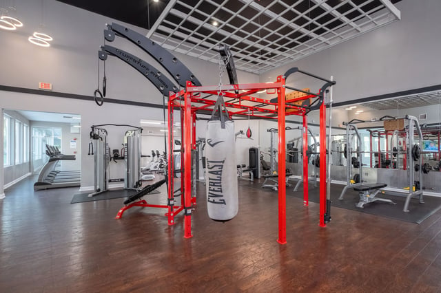 Gym with punch bag treadmills and weight machines Gym at Gainesville Place in Gainesville Student Accommodation