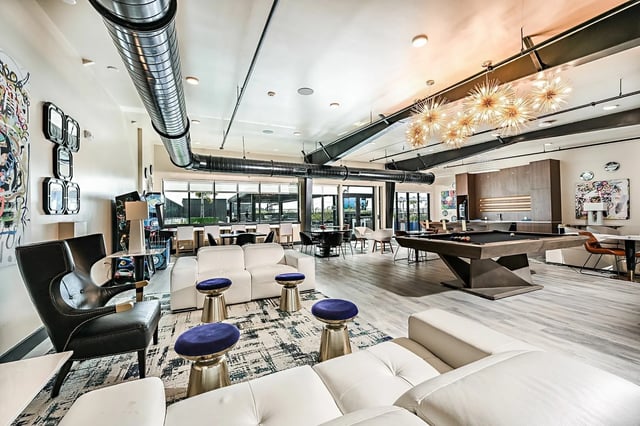 Modern lounge with pool table and seating living room at Park Place Tampa in Tampa Student Accommodation