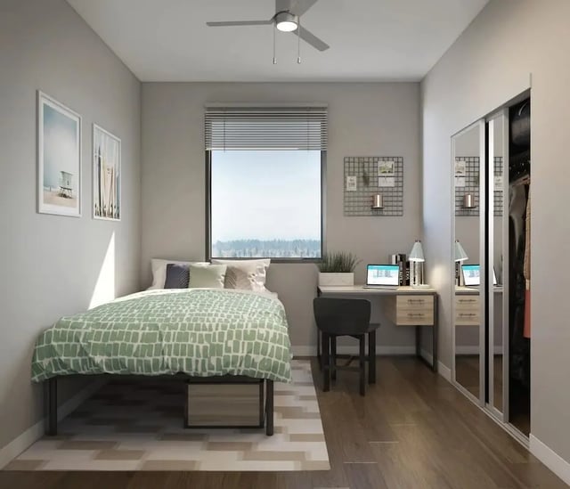 Bed desk chair and closet Bedroom at Nine31 in Gainesville Student Accommodation
