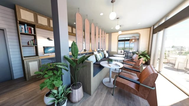 Lounge area with seating and desks study area at Nine31 in Gainesville Student Accommodation
