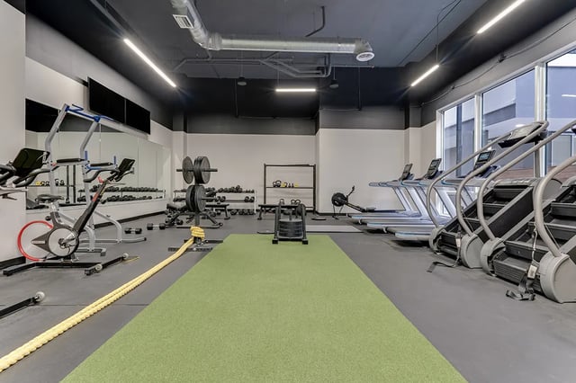 Treadmills stair climbers weights and rope gym at Midtown Gainesville in Gainesville Student Accommodation