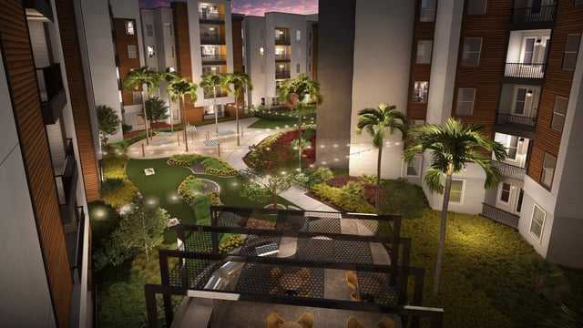 Courtyard with hammocks and grill exterior at The 9 UCF in Orlando Student Accommodation