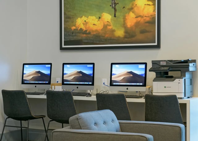 Four computers printer and chairs Study area at The Nine at Tallahassee in Tallahassee Student Accommodation