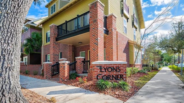 Lyons Corner sign brick building exterior at Lyons Corner Apartments in Gainesville Student Accommodation