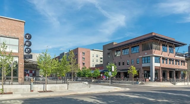 Brick buildings with trees and sidewalks exterior at FSU Collegetown in Tallahassee Student Accommodation