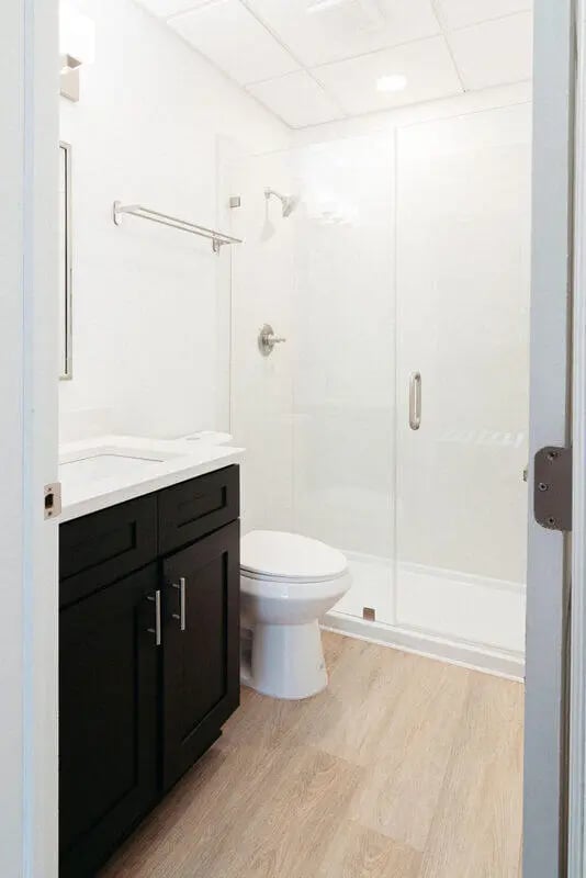 Vanity toilet shower stall bathroom at CigarLofts in Tampa Student Accommodation