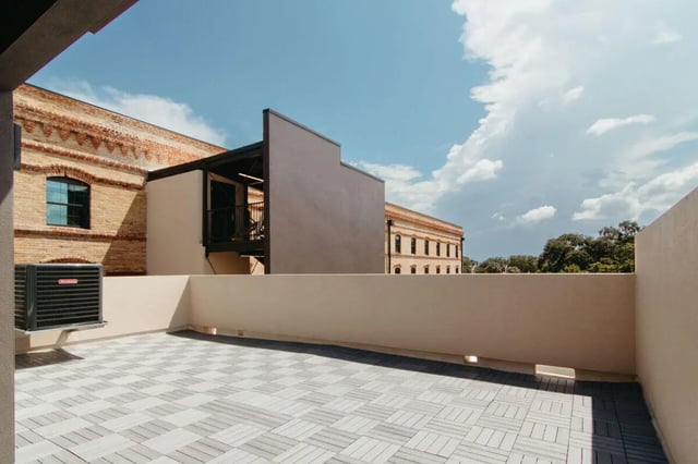 Tiled balcony with air conditioner exterior view at CigarLofts in Tampa Student Accommodation